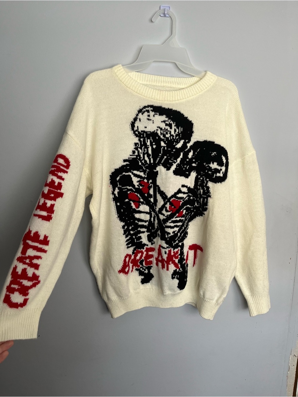 SHEIN Cream Graphic Crewneck Sweater with Black & Red Skeleton Design